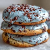 Buttery, pale blue cookies with chocolate speckles, perfect for festive spring gatherings and Easter tables.