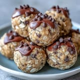Delicious snack-sized protein balls with peanut butter, oats, and chocolate chips.