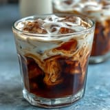 Decadent cold brew coffee swirled with homemade vanilla sweet cream perfection.