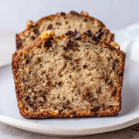 Warm and comforting homemade banana bread, ideal for a sweet breakfast treat.