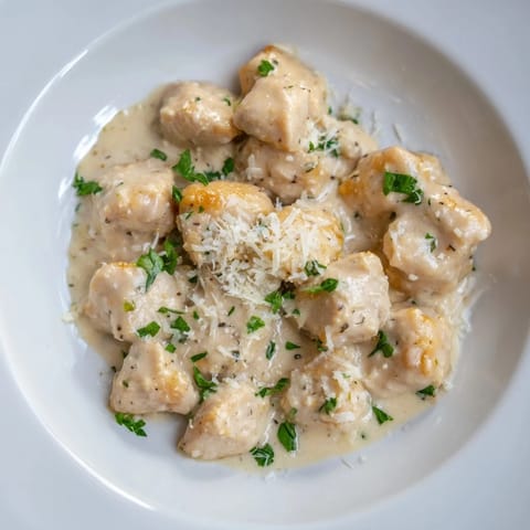 Tender Creamy Garlic Chicken Bites coated in a buttery, garlic-infused sauce, ready to serve hot.