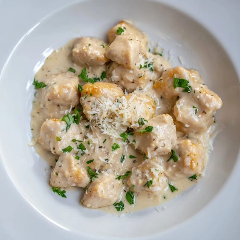 Tender Creamy Garlic Chicken Bites coated in a buttery, garlic-infused sauce, ready to serve hot.