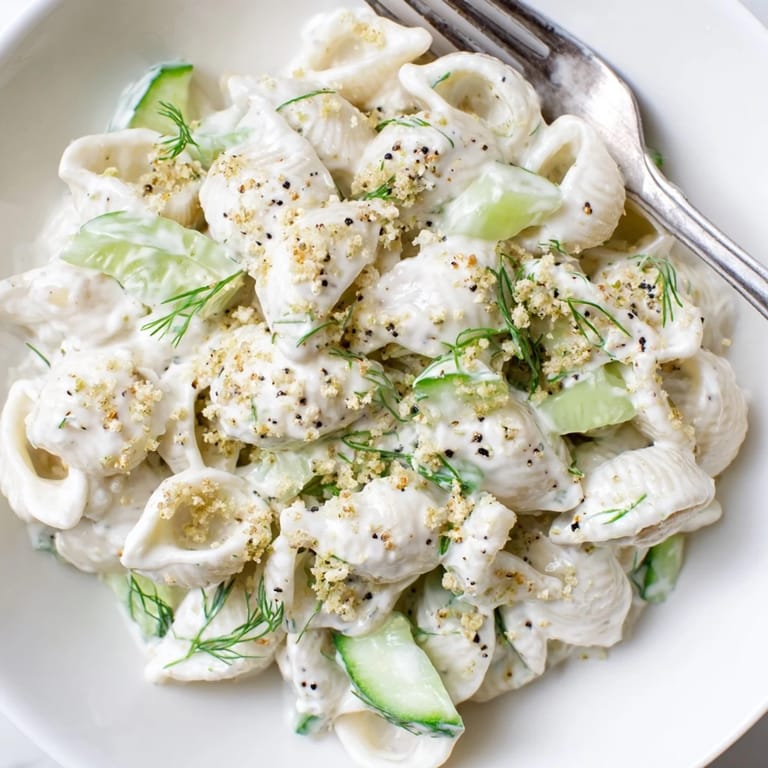 Refreshing Cucumber Crunch Pasta Salad with diced cucumbers, green onions, and creamy dressing, perfect for easy meal prep.