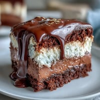 Graduation Cake: White Chocolate Drip with Gold Balloons, a festive vanilla sponge dessert with silky white chocolate buttercream and dramatic ganache drip.